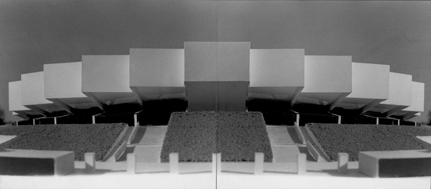 Model of the arena set partly into a garden
