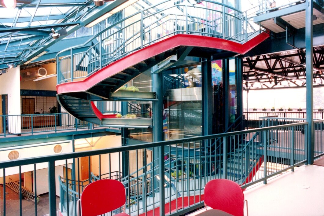 The central stair and lobby with city views