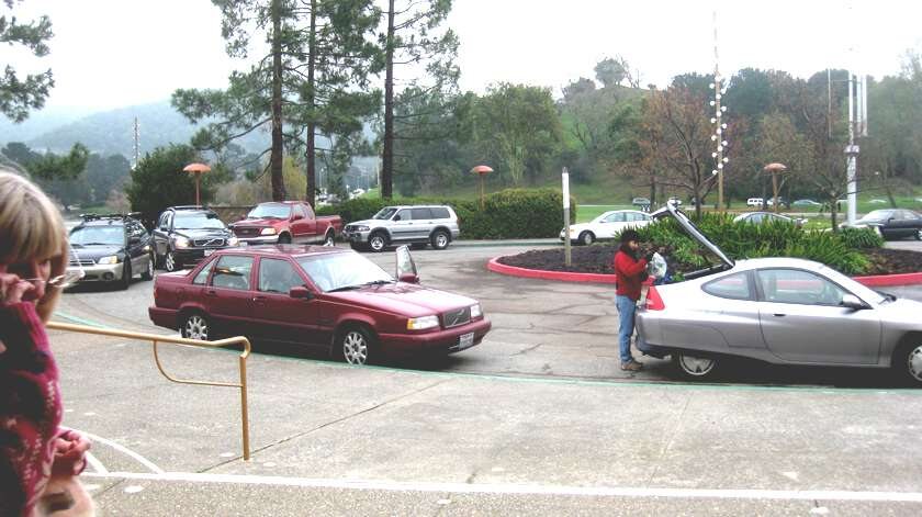Cars and pedestrians mixing in front of the Veterans' Memorial Auditorium before the improvements